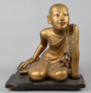 Museum No. As1983,05.7, 'Boy figure (kneeling, with base) made of wood, paint, glass, gilt'. © The Trustees of the British Museum 